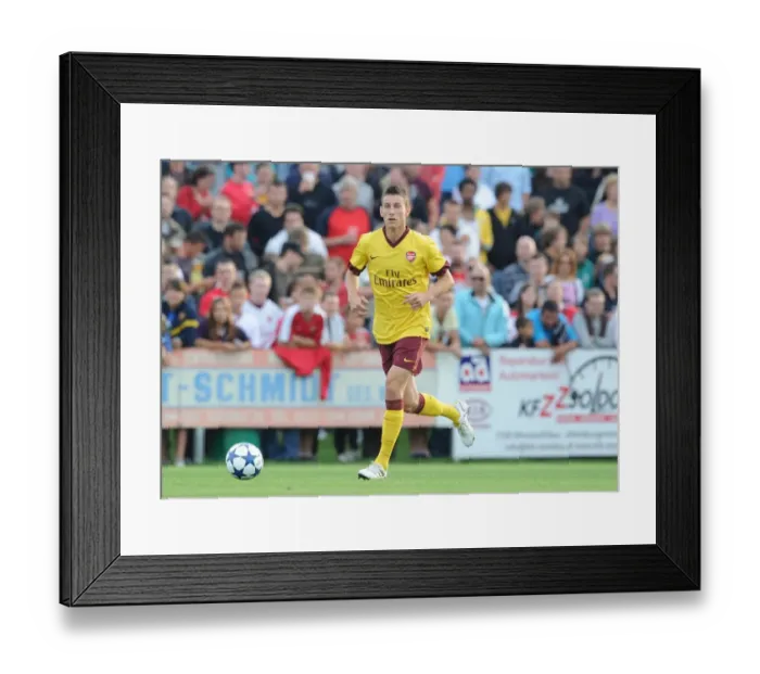 Framed Print : Arsenal's Koscielny Shines in 4-0 Victory over SC Neusiedl