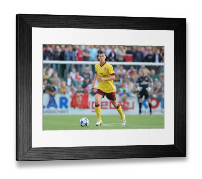 Framed Print : Koscielny's Dominance: Arsenal's 4-0 Victory over SC Neusiedl
