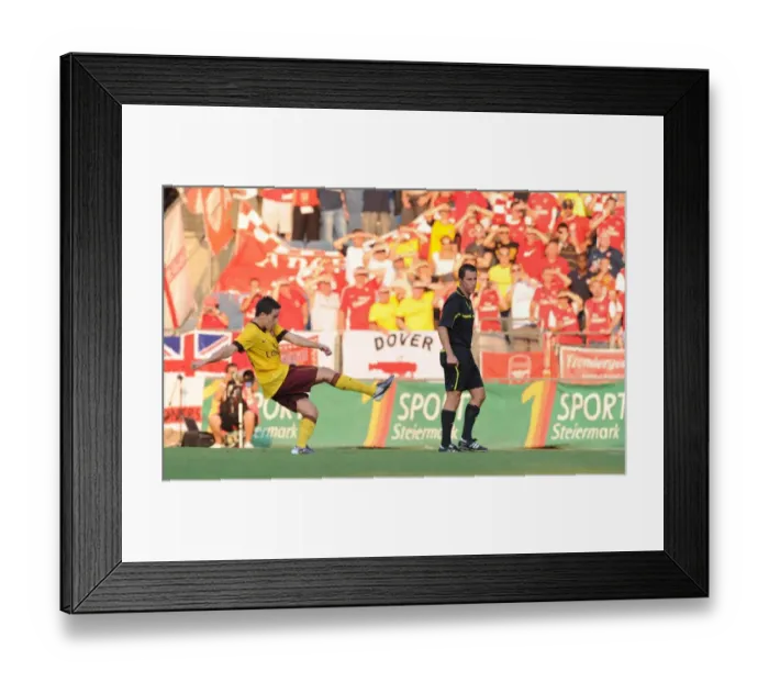 Framed Print : Samir Nasri shoots past Sturm Graz goalkeeper Silvije Cavlina to score the 2nd Arsenal goal