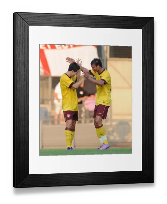 Framed Print : Samir Nasri and Marouane Chamakh: Celebrating Arsenal's Second Goal Against Sturm Graz (2010)