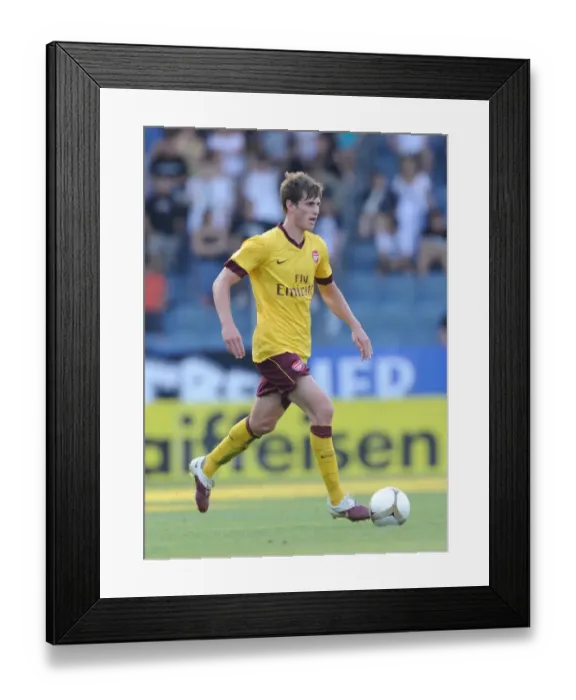 Framed Print : Harvard Nordtveit's Leading Performance: Arsenal's 4-0 Triumph Over Sturm Graz, 2010