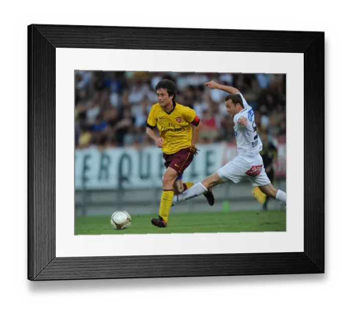 Framed Print : Arsenal's Rosicky Overpowers Feldhofer as Graz Crumbles (4-0)