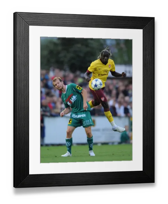 Framed Print : Bacary Sagna (Arsenal) Bauer (Neusiedl). SC Neusiedl 0: 4 Arsenal, Sportzentrum Neusiedl