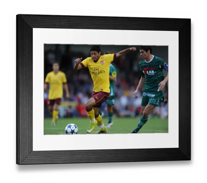 Framed Print : Carlos Vela (Arsenal) Seywerth (Neusiedl). SC Neusiedl 0: 4 Arsenal, Sportzentrum Neusiedl