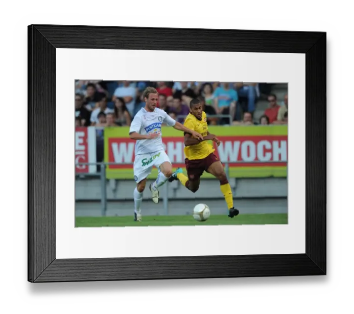 Framed Print : Armand Traore (Arsenal) Martin Ehrenreich (Sturm Graz). Sturm Graz 0: 4 Arsenal Framed Print : Armand Traore (Arsenal) Martin Ehrenreich (Sturm Graz). Sturm Graz 0: 4 Arsenal