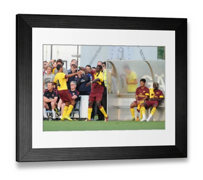 Framed Print : Theo Walcott celebrates scoring the 1st Arsenal goal with Emmanuel Eboue