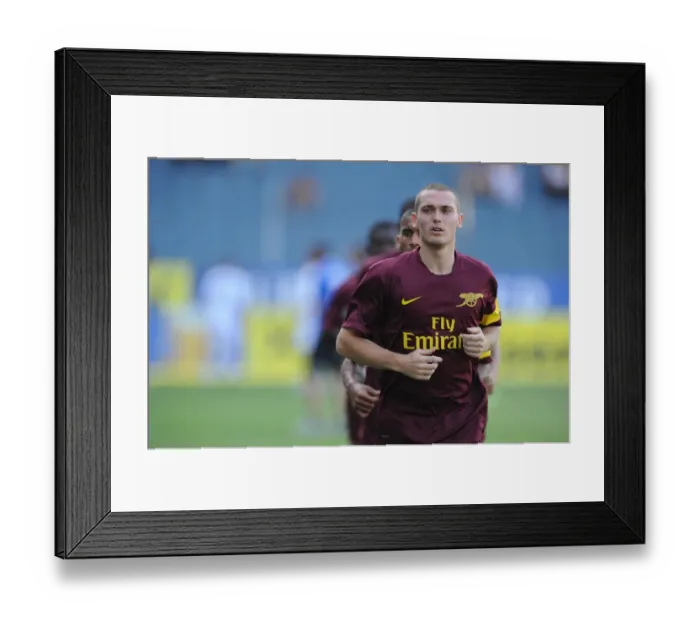 Framed Print : Thomas Vermaelen's Unforgettable Debut: Arsenal's 4-0 Rout of Sturm Graz, Austria 2010