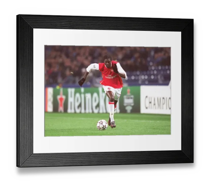 Framed Print : Adebayor's Battle: 0-0 Stalemate Against FC Porto in Champions League Group G