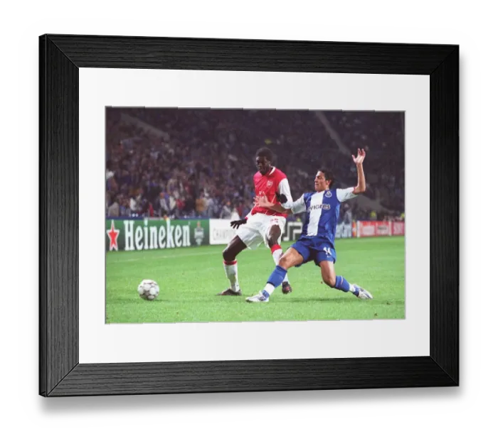 Framed Print : Emmanuel Adebayor (Arsenal) Bruno Alves (Porto) Framed Print : Emmanuel Adebayor (Arsenal) Bruno Alves (Porto)