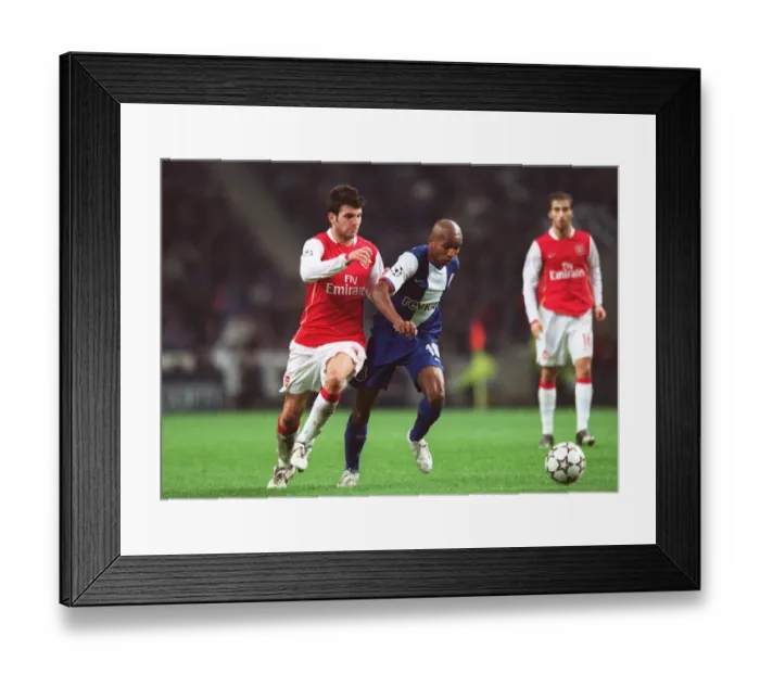 Framed Print : Cesc Fabregas (Arsenal) Paulo Assuncao (Porto) Framed Print : Cesc Fabregas (Arsenal) Paulo Assuncao (Porto)