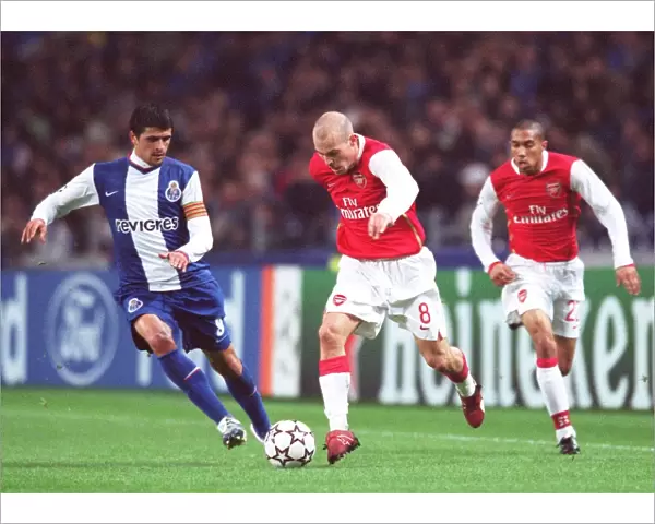 Freddie Ljungberg and Gael Clichy (Arsenal) Lucho Gonzalez (Porto)