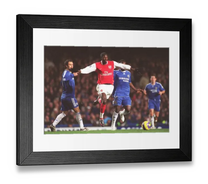 Framed Print : Adebayor vs Essien: The Battle at Stamford Bridge - Arsenal vs Chelsea, FA Premiership, 10 / 12 / 06