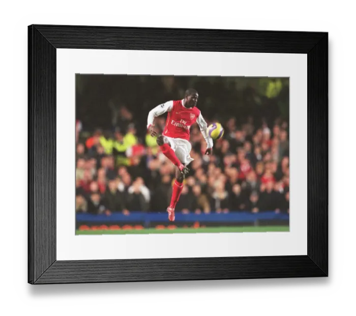 Framed Print : Arsenal's Eboue in Action during Chelsea Rivalry: 10 / 12 / 06 FA Premiership Draw