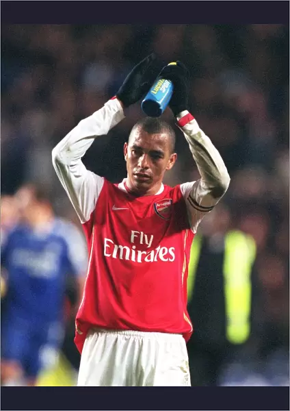 Gilberto (Arsenal) claps the fans at the end of the match