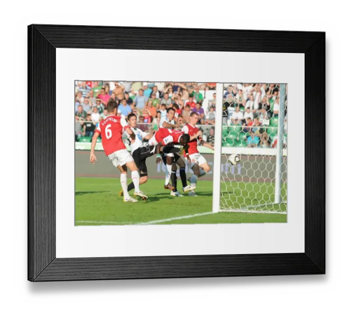 Framed Print : Emmanuel Eboue Scores the Second Goal: Arsenal's Comeback against Legia Warsaw, Poland 2010 Framed Print : Emmanuel Eboue Scores the Second Goal: Arsenal's Comeback against Legia Warsaw, Poland 2010