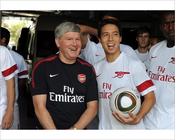 Arsenal assistant manager Pat Rice with Samir Nasri before the match. Legia Warsaw 5