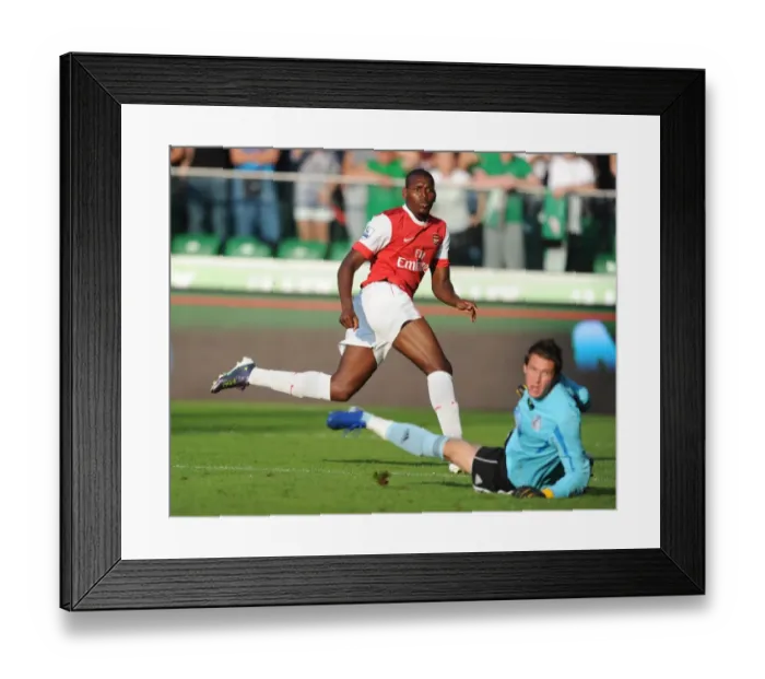 Framed Print : Jay Emmanuel Thomas shoots past Legia goalkeeper Kostyantyn Makhnovskyy to score the 5th Arsenal goal. Legia Warsaw 5: 6 Arsenal, Wojska Polskiego, Warsaw, Poland, 7 / 8 / 2010. Credit : Stuart MacFarlane / Arsenal Framed Print : Jay Emmanuel Thomas shoots past Legia goalkeeper Kostyantyn Makhnovskyy to score the 5th Arsenal goal. Legia Warsaw 5: 6 Arsenal, Wojska Polskiego, Warsaw, Poland, 7 / 8 / 2010. Credit : Stuart MacFarlane / Arsenal