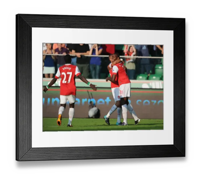 Framed Print : Five-Star Celebration: Jay Emmanuel Thomas, Kieran Gibbs, and Emmanuel Eboue Rejoice in Arsenal's 5-Goal Blitz Against Legia Warsaw Framed Print : Five-Star Celebration: Jay Emmanuel Thomas, Kieran Gibbs, and Emmanuel Eboue Rejoice in Arsenal's 5-Goal Blitz Against Legia Warsaw