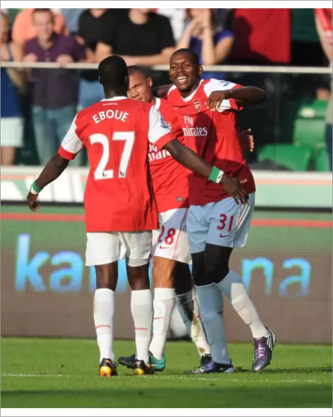 Jay Emmanuel Thomas celebrates scoring the 5th Arsenal goal with Kieran Gibbs