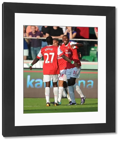Jay Emmanuel Thomas celebrates scoring the 5th Arsenal goal with Kieran Gibbs