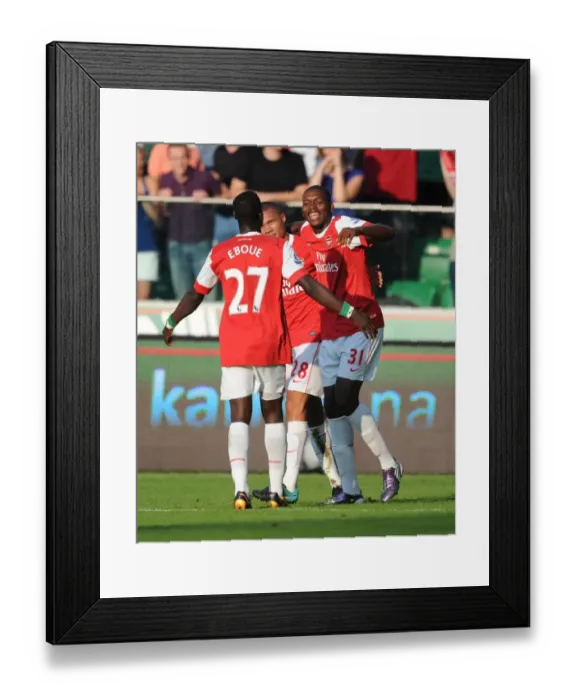 Framed Print : Jay Emmanuel Thomas celebrates scoring the 5th Arsenal goal with Kieran Gibbs