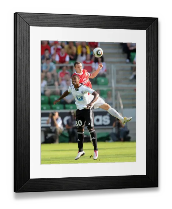 Framed Print : Thomas Vermaelen (Arsenal) Bruno Mezenga (Leiga). Legia Warsaw 5: 6 Arsenal Framed Print : Thomas Vermaelen (Arsenal) Bruno Mezenga (Leiga). Legia Warsaw 5: 6 Arsenal