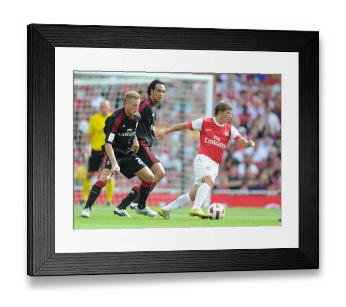 Framed Print : Andrey Arshavin (Arsenal) Ignazio Abate (Milan). Arsenal 1: 1 AC Milan. Emirates Cup