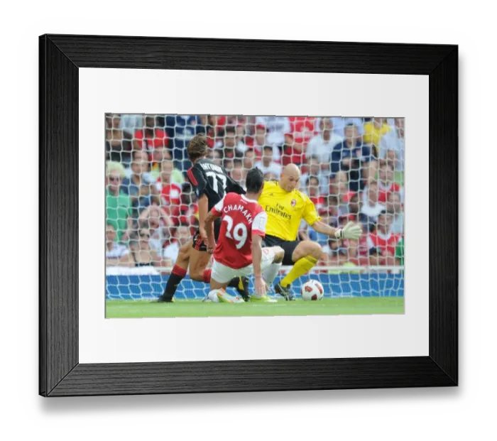 Framed Print : Marouane Chamakh beats Christian Abbiata (Milan) to score Arsenals goal