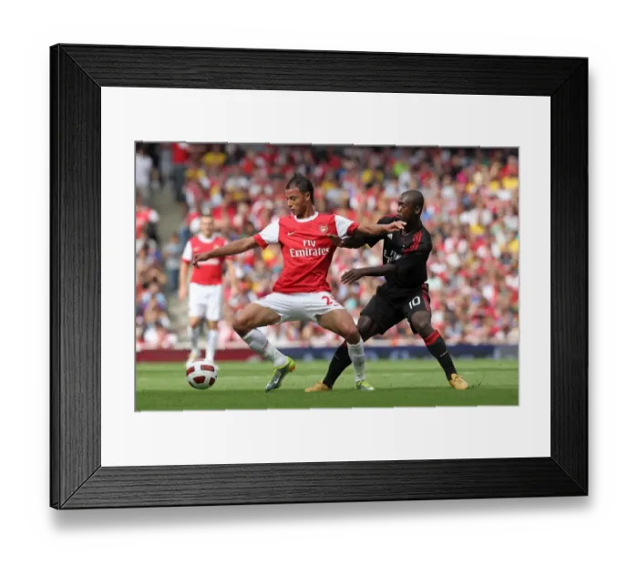 Framed Print : Marouane Chamakh (Arsenal) Clarence Seedorf (Milan). Arsenal 1: 1 AC Milan Framed Print : Marouane Chamakh (Arsenal) Clarence Seedorf (Milan). Arsenal 1: 1 AC Milan