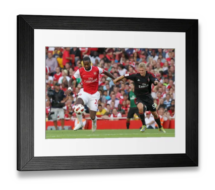 Framed Print : Johan Djourou (Arsenal) Alexander Merkel (Milan). Arsenal 1: 1 AC Milan