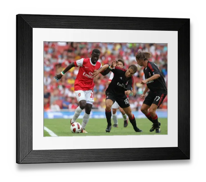 Framed Print : Emmanuel Eboue (Arsenal) Mathieu Flamini and Luca Antonini (Milan). Arsenal 1: 1 AC Milan