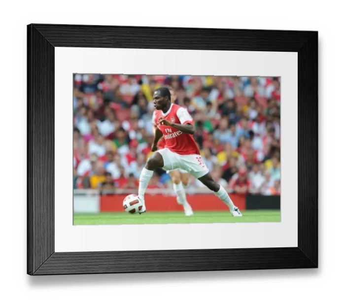 Framed Print : Intense Showdown: Arsenal's Emmanuel Frimpong vs AC Milan in the Emirates Cup Framed Print : Intense Showdown: Arsenal's Emmanuel Frimpong vs AC Milan in the Emirates Cup