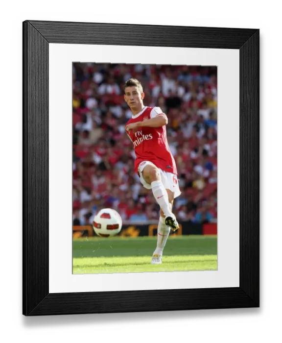 Framed Print : Arsenal's Laurent Koscielny in Action Against AC Milan at the Emirates Cup, 2010 Framed Print : Arsenal's Laurent Koscielny in Action Against AC Milan at the Emirates Cup, 2010