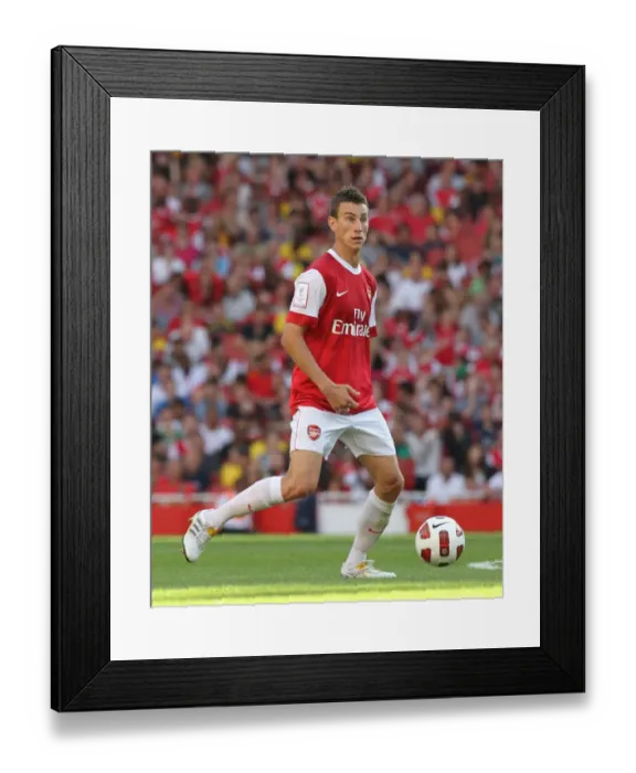 Framed Print : Arsenal's Laurent Koscielny vs AC Milan at Emirates Cup 2010: A Tight 1-1 Battle