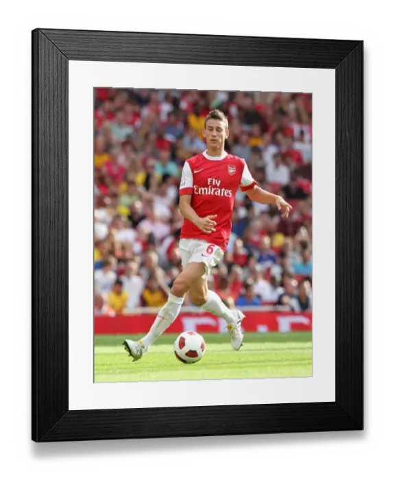 Framed Print : Arsenal's Laurent Koscielny vs AC Milan at Emirates Cup 2010: A Battle of 1-1 Framed Print : Arsenal's Laurent Koscielny vs AC Milan at Emirates Cup 2010: A Battle of 1-1