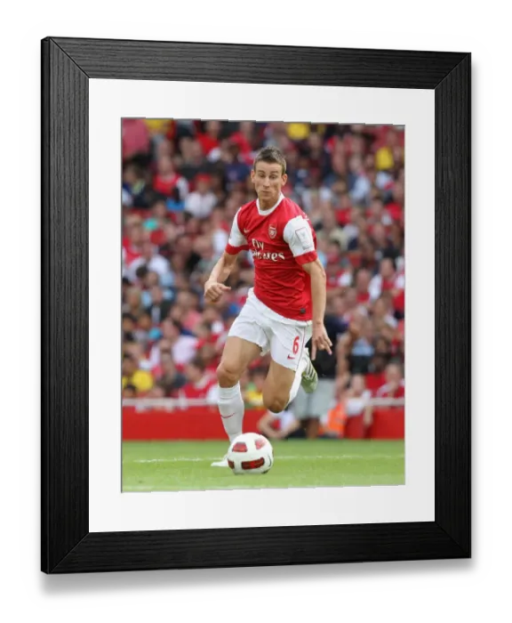 Framed Print : Arsenal's Laurent Koscielny in Action Against AC Milan: A 1-1 Draw at Emirates Cup, 2010 Framed Print : Arsenal's Laurent Koscielny in Action Against AC Milan: A 1-1 Draw at Emirates Cup, 2010