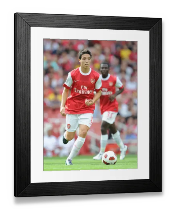 Framed Print : Samir Nasri (Arsenal). Arsenal 1: 1 AC Milan. Emirates Cup, pre season. Emirates Stadium Framed Print : Samir Nasri (Arsenal). Arsenal 1: 1 AC Milan. Emirates Cup, pre season. Emirates Stadium