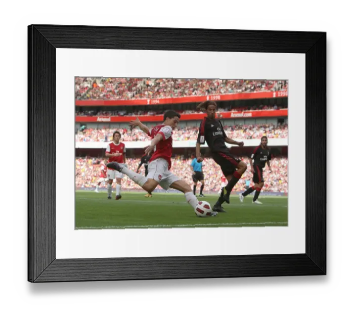 Framed Print : Samir Nasri (Arsenal) Luca Antonini (Milan). Arsenal 1: 1 AC Milan. Emirates Cup Pre Season
