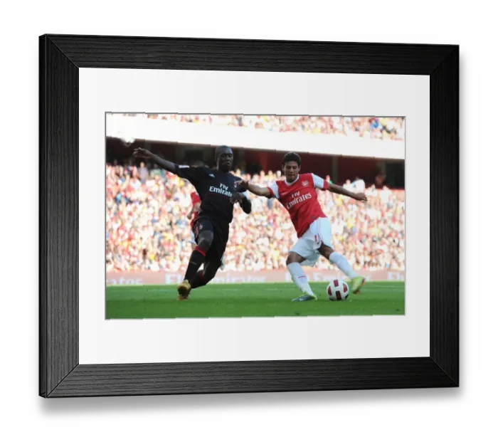 Framed Print : Carlos Vela (Arsenal) Clarence Seedorf (Milan). Arsenal 1: 1 AC Milan. Emirates Cup