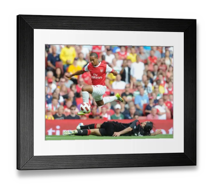Framed Print : Theo Walcott vs. Mario Yepes: A Draw at the Emirates Cup Framed Print : Theo Walcott vs. Mario Yepes: A Draw at the Emirates Cup