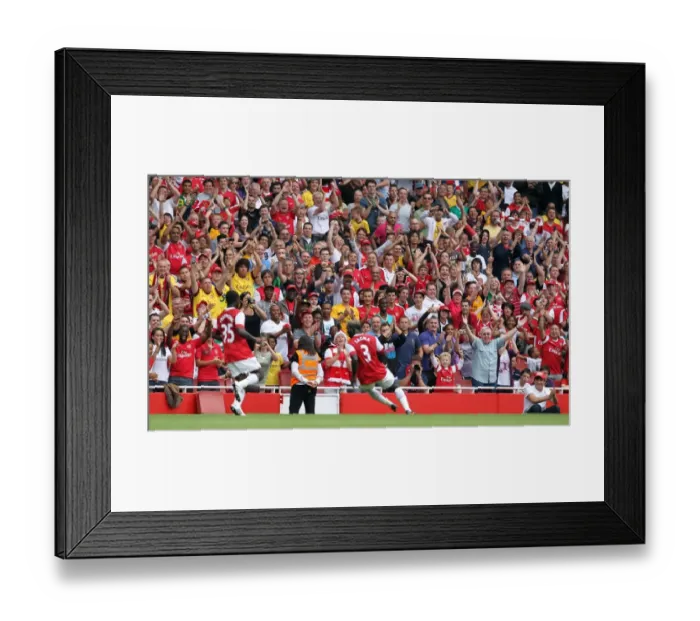 Framed Print : Arsenal fans celebrate Bacary Sagnas 2nd goal. Arsenal 3: 2 Celtic