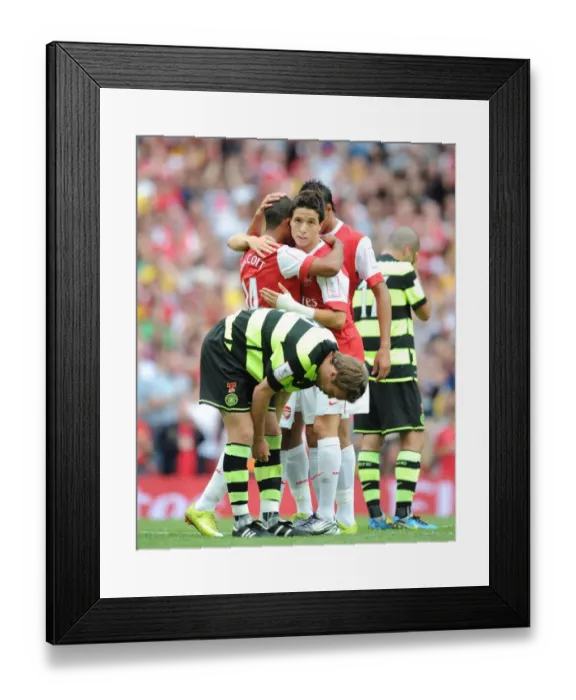 Framed Print : Samir Nasri celebrates scoring Arsenals 3rd goal. Arsenal 3: 2 Celtic