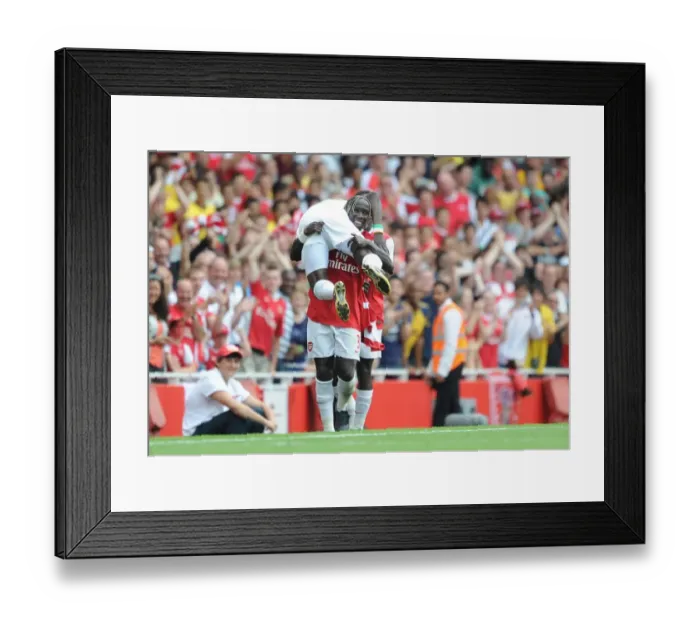 Framed Print : Sagna and Eboue: Arsenal's Unstoppable Duo Celebrate Goal in Emirates Cup Victory Framed Print : Sagna and Eboue: Arsenal's Unstoppable Duo Celebrate Goal in Emirates Cup Victory
