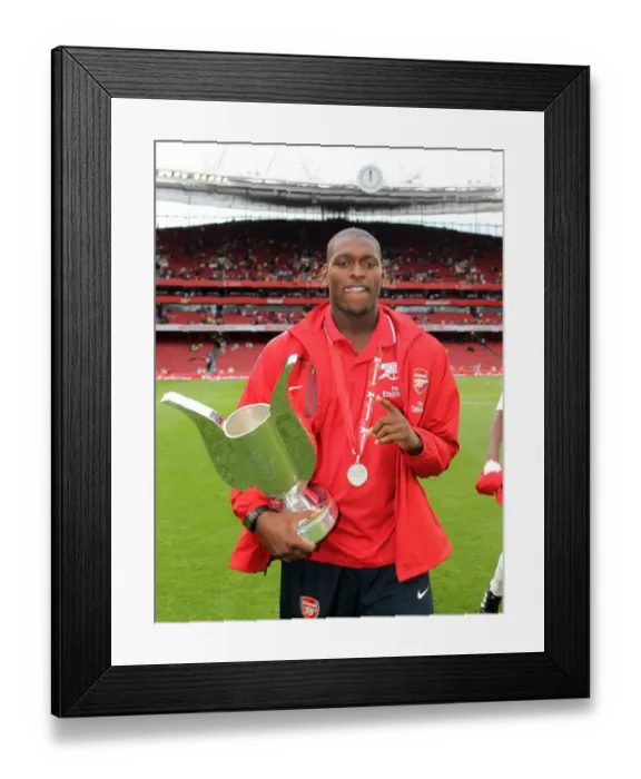 Framed Print : Jay Thomas (Arsenal) with the Emirates trophy. Arsenal 3: 2 Celtic. Emirates Cup Pre Season Framed Print : Jay Thomas (Arsenal) with the Emirates trophy. Arsenal 3: 2 Celtic. Emirates Cup Pre Season