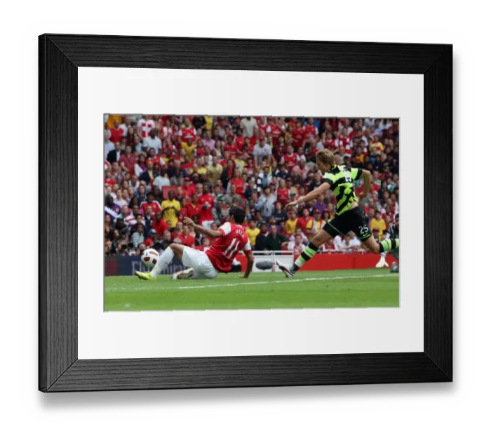 Framed Print : Carlos Vela scores Arsenals 1st goal under pressure from Thomas Rogne (Celtic)