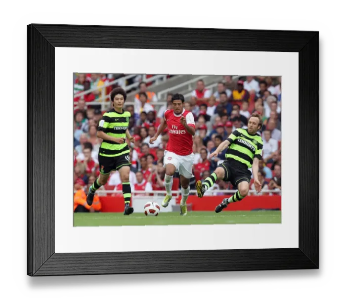 Framed Print : Carlos Vela (Arsenal) Andreas Hinkel and Ki Sung-Yueng (Celtic). Arsenal 3: 2 Celtic