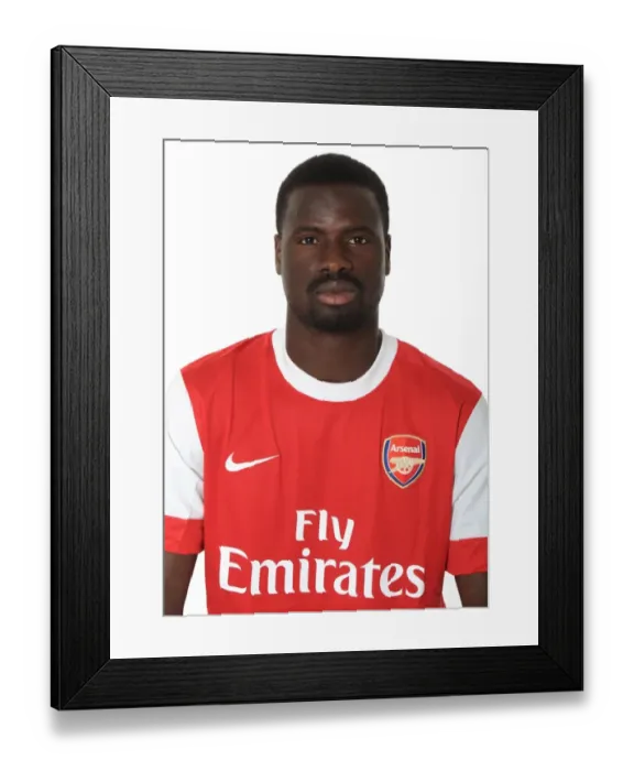 Framed Print : Emmanuel Eboue (Arsenal). Arsenal 1st Team Photocall and Membersday. Emirates Stadium