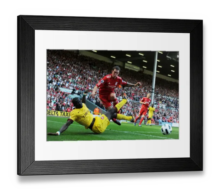 Framed Print : Emmanuel Eboue (Arsenal) Daniel Agger (Liverpool). Liverpool 1: 1 Arsenal