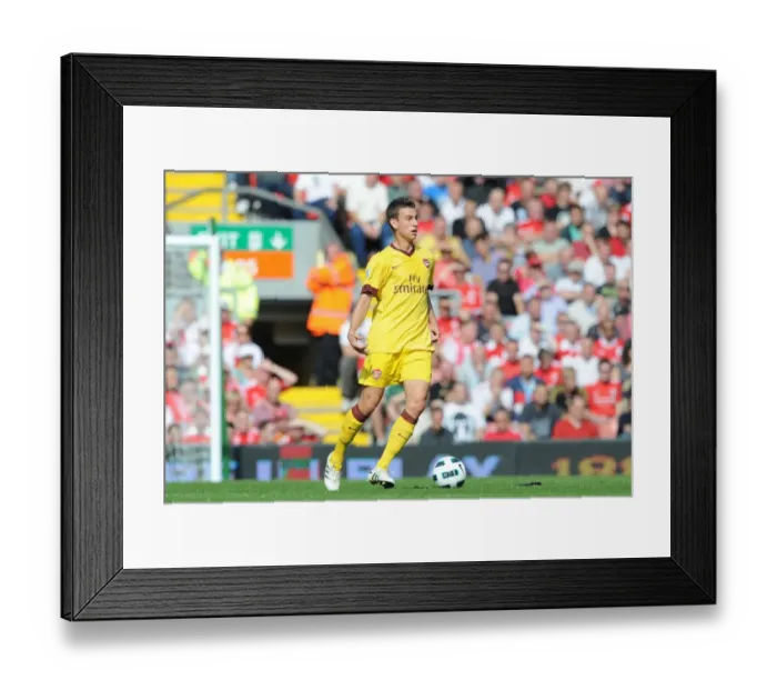 Framed Print : Laurent Koscielny (Arsenal). Liverpool 1: 1 Arsenal, Barclays Premier League Framed Print : Laurent Koscielny (Arsenal). Liverpool 1: 1 Arsenal, Barclays Premier League