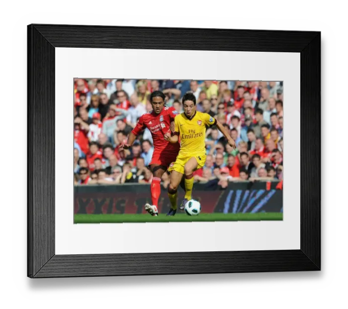 Framed Print : Nasri vs. Johnson: Stalemate at Anfield - Arsenal vs. Liverpool, Premier League 2010-11